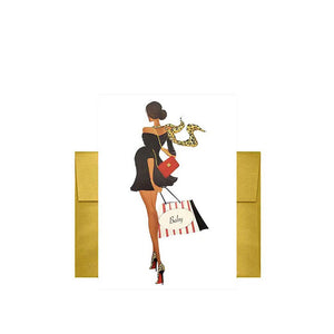 greeting card with illustration of pregnant mom carrying a bag with the word 'baby' in front of envelope