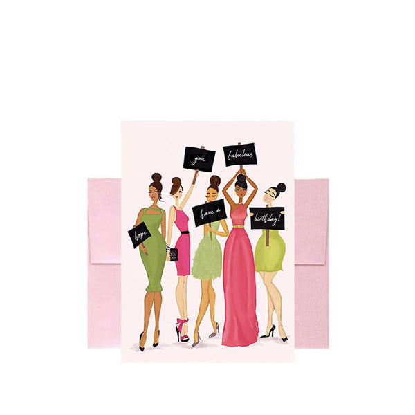 Birthday greeting card with illustration of women in pink and green holding signs that read 'hope you have a fabulous birthday!' and a pink envelope